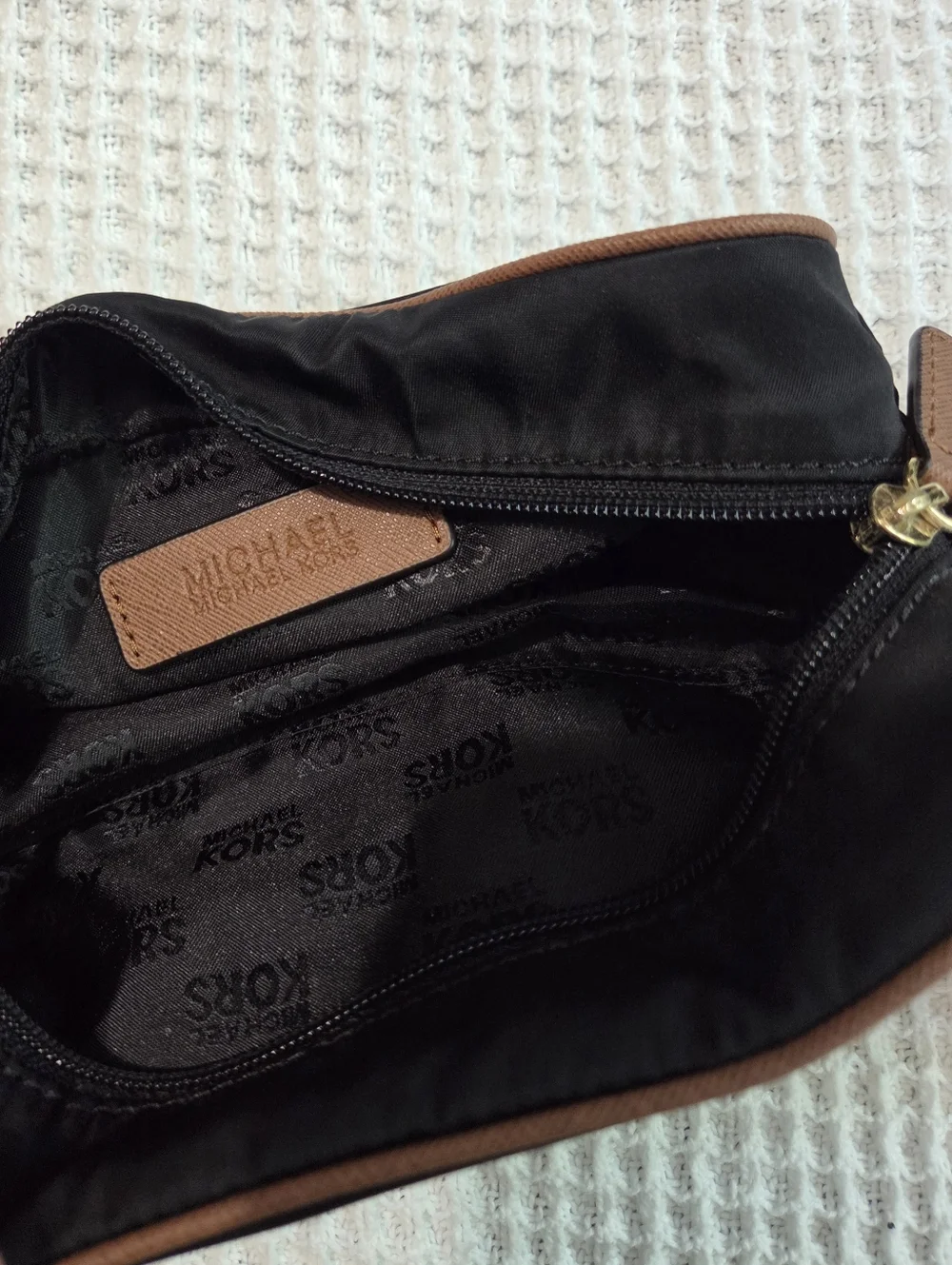 Michael Kors Black Cosmetic Case with Brown Trim and Gold Plaque